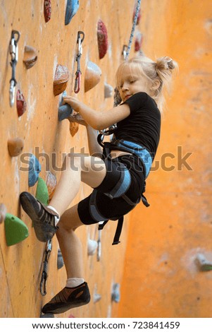 Similar – Image, Stock Photo Girl climbs climbing wall