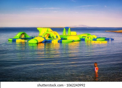 Bouncy Castle On Blue Sea Background