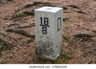 Boundary Marker Border Stone In Forest Border Mountains