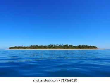 BOUNTY ISLAND, FIJI - Idilic view of Bounty Island with beautiful sky, palm trees and aqua water. - Shutterstock ID 719369620