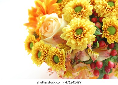 Bouquet of autumn flowers with pumpkin