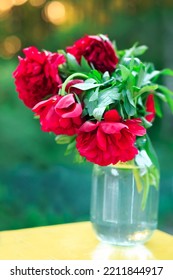 Bouquet Of Beautiful Pink Peonies In A Vintage Glass Vase On A Table 