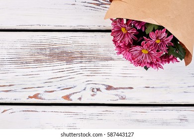 Bouquet Of Chrysanthemums On Wood. Holiday Gift Guide.