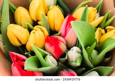 Bouquet of colored tulips close-up, a beautiful bouquet of tulips on the background of nature. Spring landscape. Floral background. - Shutterstock ID 1934919776