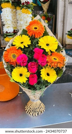 Bouquet of colorful roses, Eustoma, Tulip, other different flowers at entrance flower store. Showcase. Beautiful flowers for catalog, online store. Flower business. Concept flower store and delivery.