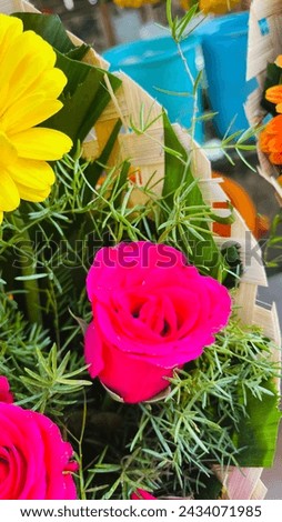 Bouquet of colorful roses and other different flowers at the entrance of the flower store. Showcase. Beautiful flowers for a catalog, online store. Flower business. Сoncept flower store and delivery.