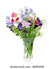 Bouquet Of Colorful Sweet Pea Flowers In Glass Vase