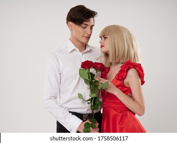 Bouquet of flowers and young people Valentine's Day model - Shutterstock ID 1758506117