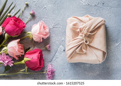 Bouquet of pink flowers on a gray background. zero waste gift on Mother's Day. Women's day card. 8 march happy womens day - Shutterstock ID 1615207525
