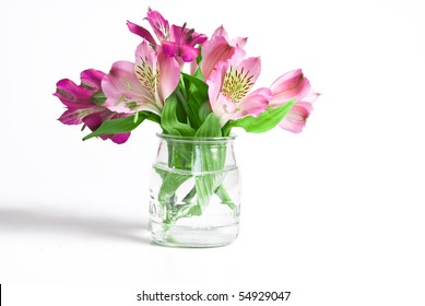 Bouquet Of Pink Flowers In Vase Isolated On White Background