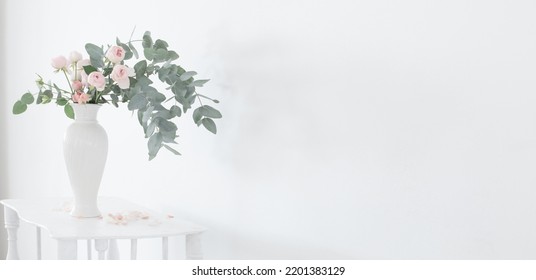 Bouquet Of Pink Roses In Ceramic White Vase  On White Vintage Wooden Shelf