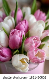 bouquet of pink and white tulips in a rose box