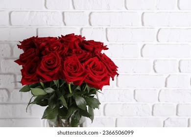 Bouquet of red roses in vase - Powered by Shutterstock