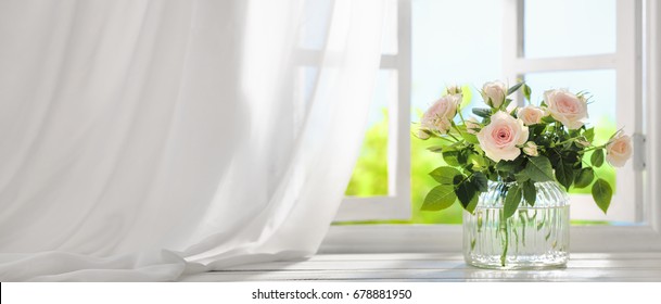 Bouquet Of Rose Flowers Near Window With Curtain