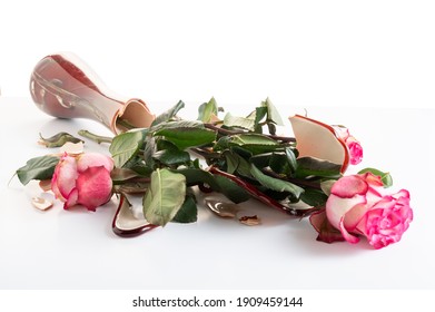 A Bouquet Of Roses In A Broken Vase. Spoiled Flowers In A Vase. Broken Bouquet Of Roses In A Vase.