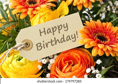bouquet with roses, gerbera  and anemones with birthday card/happy  birthday/english