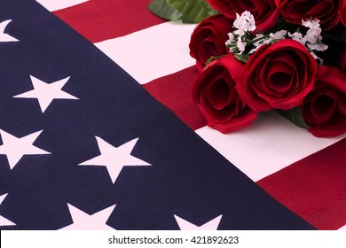 Bouquet of roses on American flag - close up