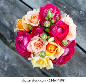 bouquet of roses on wooden table - Powered by Shutterstock