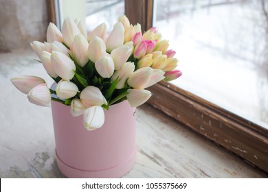 Bouquet With White Tulips In A Pink Box On The Window. Spring Flower Arrangement