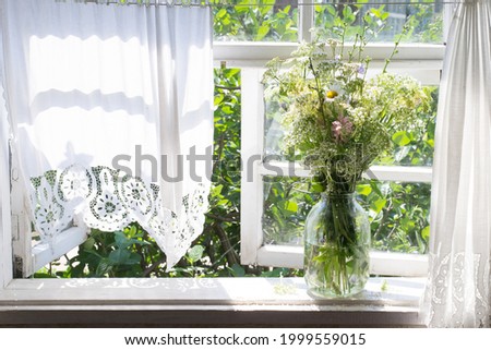 Similar – Acacia bouquet on the table in living room