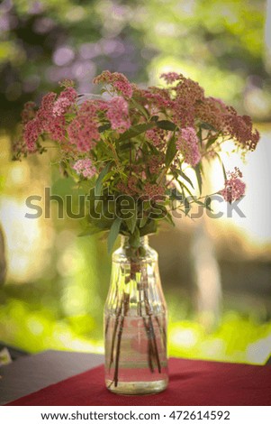 A bouquet of wild flowers in a vase