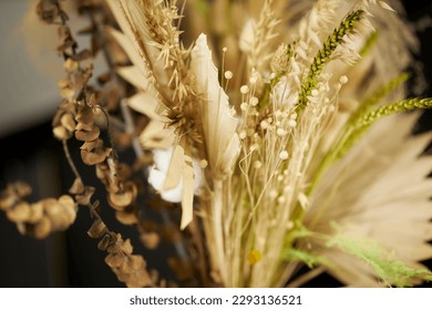 bouquet of yellow dried flowers. bouquet of dried flowers of golden color, close-up - Powered by Shutterstock