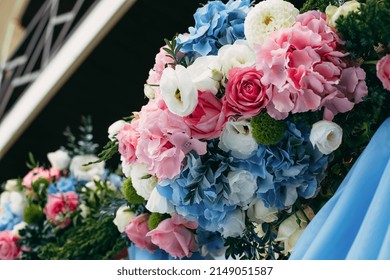 Bouquets Of Blue, White, Pink And Red Flowers Adorn The Wedding Venue At The Entrance To The Restaurant.