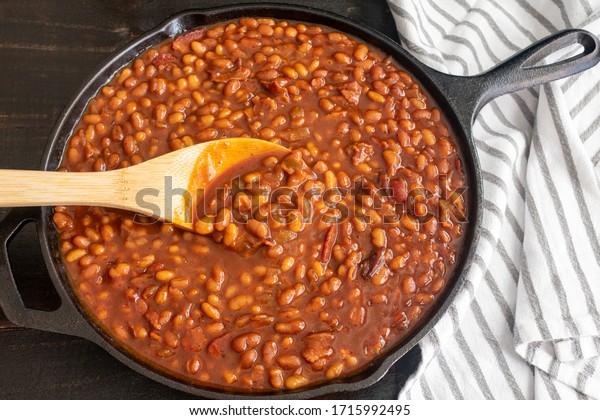 Bourbon Baked\
Beans in a Cast Iron Skillet: Pork and beans seasoned with bourbon\
whiskey, molasses, and brown\
sugar