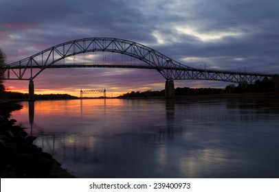 Bourne Bridge In Cape Cod At Sunset