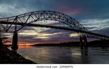 Bourne Bridge In Cape Cod At Sunset