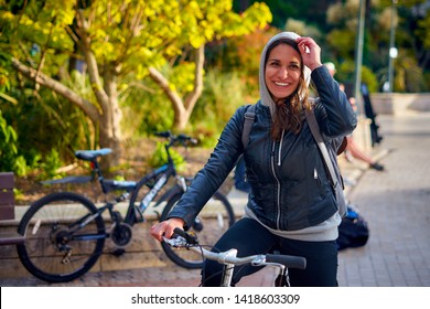 Bournemouth, Dorset / England - June 06 2019: Beautiful Smiling Young Italian Woman, On Vintage Bicycle On The Square. International Internship Student From Bournemouth University                    