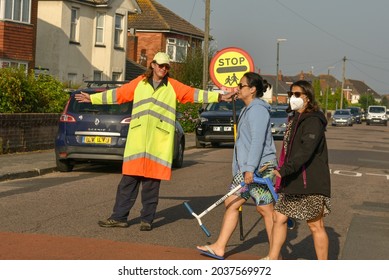 Bournemouth, UK-September 06, 2021: Two Mothers Going Back After Accompanying Their Children To School Following The Reopening Of Schools  Despite Tens Of Thousands Of Covid-19 Cases Reported 