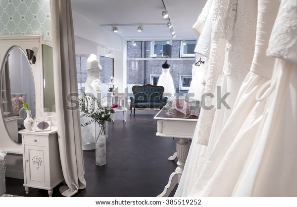 Boutique Bridal Shop, changing area and shop\
interior, Beautiful Wedding\
Gowns