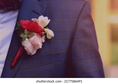 boutonniere groom close-up on a blue background