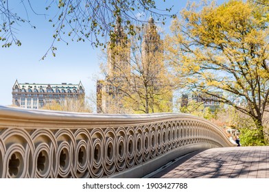 The Bow Bridge in Central Park, New York. Famous place in Manhattan.  Spring warm day. Selective focus.