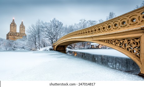 Bow Bridge In Central Park, NYC At Dawn, After A Snow Storm