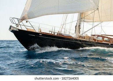 Bow Of A Sailing Yacht Cutting Through The Waves