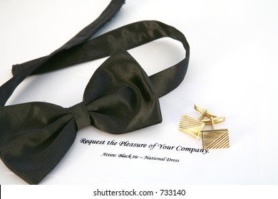 Bow Tie, Gold Cufflinks And An Invitation To A Black Tie Event