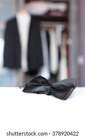 Bow Tie With Open Closet And Tuxedo. Getting Ready For Formal Night. With Isolated Place For Text.