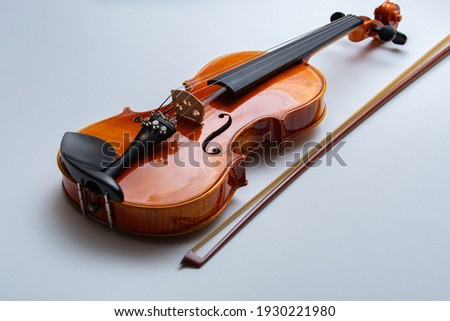 bow and violin isolated on white musical wood