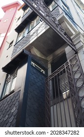 Bow Window Building In The Narrows Street Of Downtown Porto, Portugal