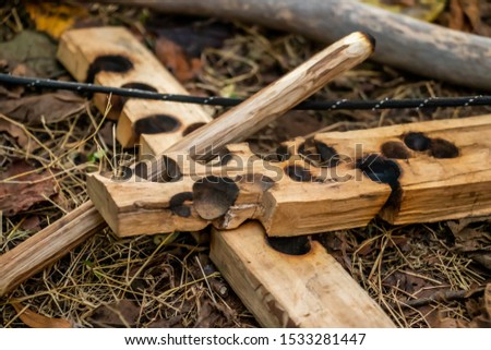 A bowdrill for making a fire by friction. Commonly used by the natives. 