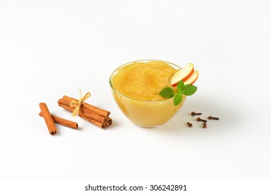 Bowl Of Apple Sauce And Spice On White Background