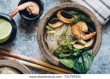 Similar – Image, Stock Photo Bowl of Asian Noodle Soup with chopsticks