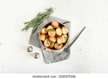 Bowl With Baked Potatoes On White Background