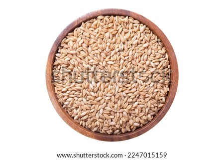 Bowl of barley grains isolated on white background, top view