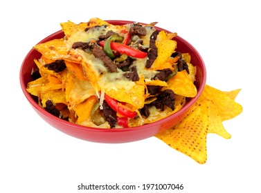 Bowl Of Beef And Cheese Nachos With Red And Green Peppers Isolated On A White Background