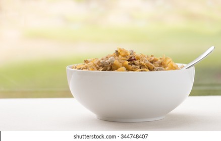 Bowl Of Breakfast Cereal With Spoon