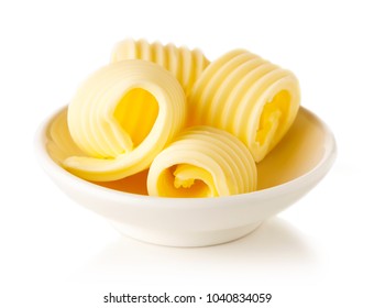 Bowl of butter curls isolated on white background