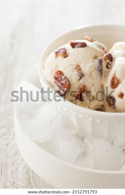 Bowl of Butter Pecan Ice\
Cream on Ice